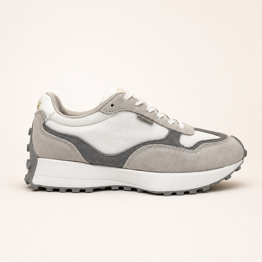 Perfil lateral derecho zapatillas casual unisex Kuse beige gris con paneles de malla blanca y serraje
