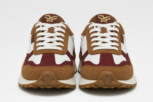 Vista frontal zapatillas Kuse unisex marrón y burdeos con diseño retro deportivo y suela de goma dentada