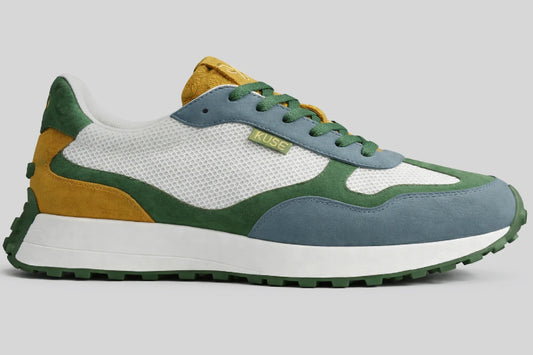 Perfil lateral zapatillas Kuse unisex verde, azul y mostaza con combinación de malla transpirable y ante